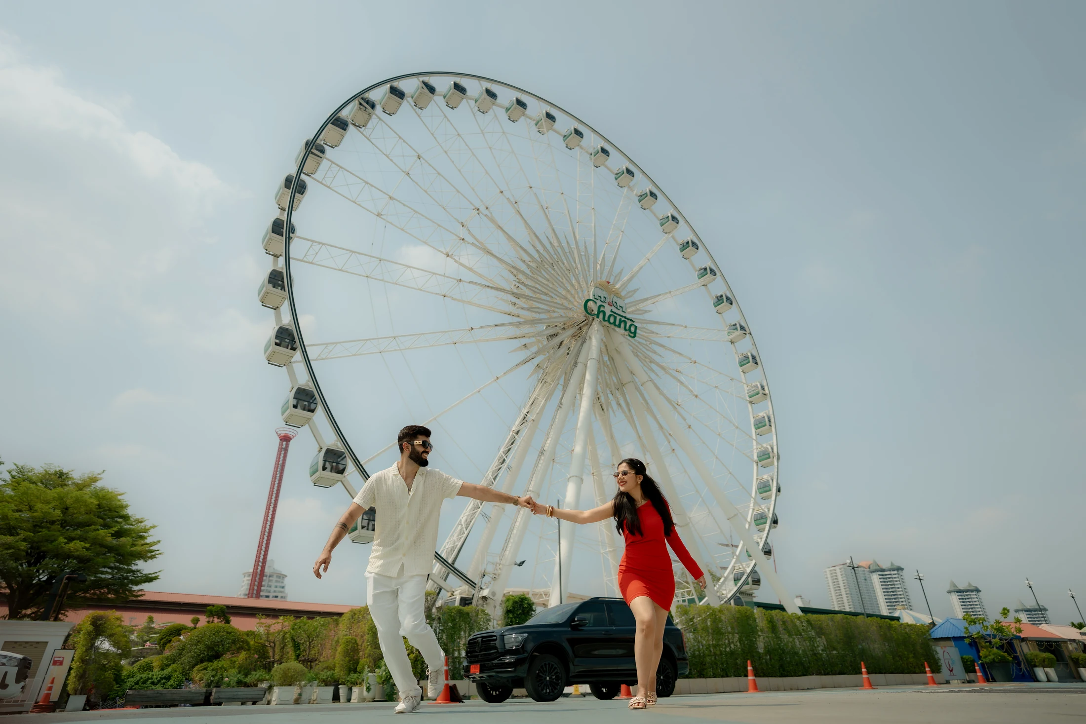 Editorial couple portrait along Victorian brick-lined path at Taj West End